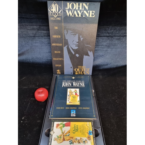 103 - A commemorative box set containing a 'The Quiet Man' film VHS tape along with a hardback book celebr... 