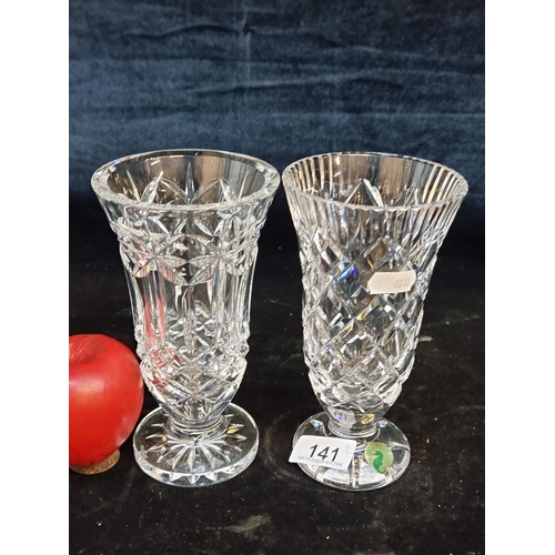 141 - A pair of timeless Waterford Crystal footed vases with one in the 'Balmoral' pattern. In very good c... 