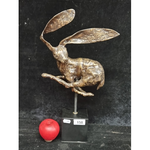 158 - Star Lot : A large Intricate heavy solid bronze sculpture depicting a whimsical hare in mid-leap, sh... 