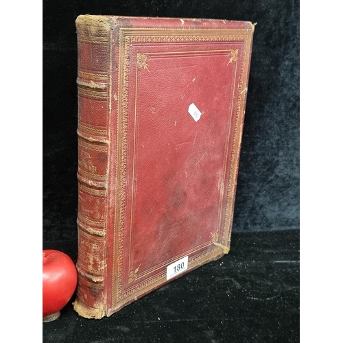 180 - A large vintage hardback book titled 