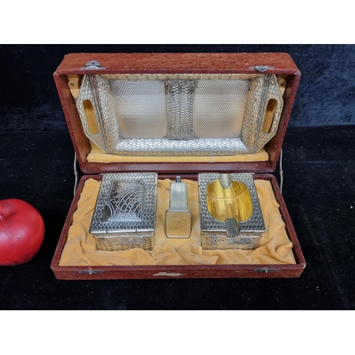 207 - A handsome early Twentieth Century smokers companion featuring lighter, ashtray, tobacco box and tra... 