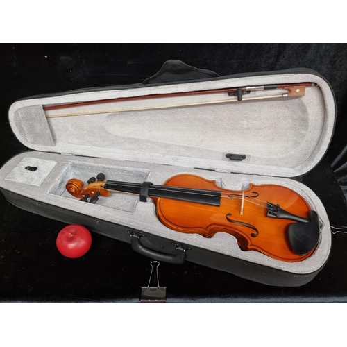 222 - A lovely full size violin, accompanied by horse hair bow, clip tuner, rosin and shoulder rest. All h... 