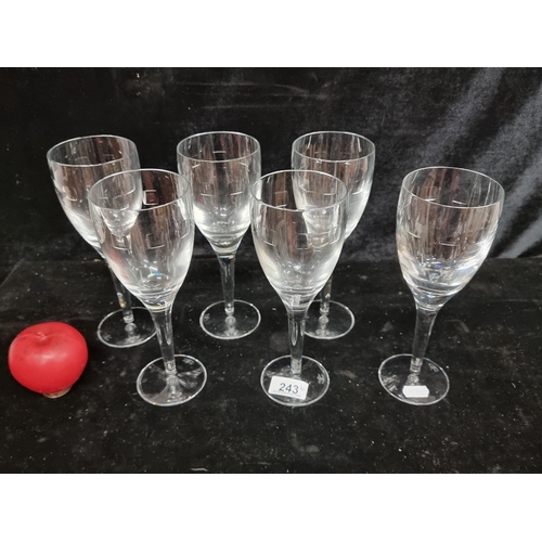 243 - A set of six very Large John Rocha for Waterford Crystal wine glasses. In good condition with acid m... 