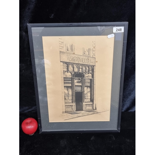 248 - A fabulous print of an engraving by Liam Delaney featuring the iconic McDaid's pub. Housed in a smar... 