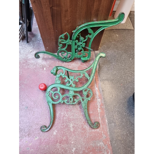 276 - A wonderful pair of antique 19th century's heavy cast metal garden bench ends, boasting intricate sc... 