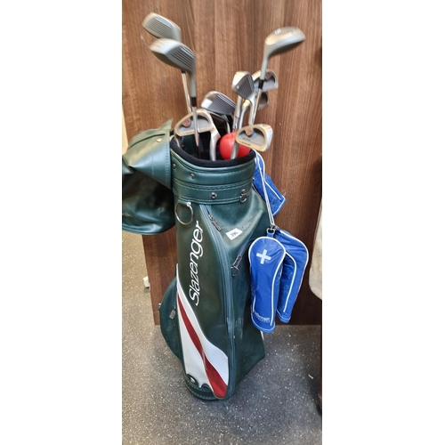 277 - A collection of 11 Dunlop Solution golf clubs including 5 and 3 woods, a driver, S and P wedges and ... 