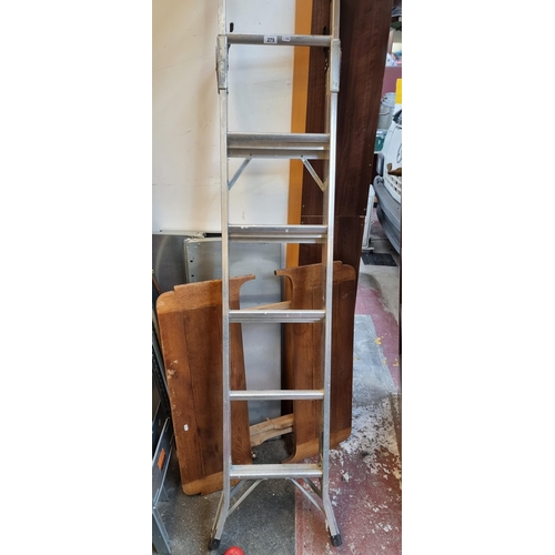 279 - A good quality aluminium ladder, can be operated as a stepladder, an extension ladder and a stairwel... 