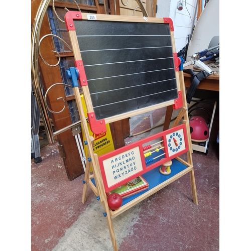 280 - A very sweet vintage children's chalkboard / whiteboard stand with abacus, training clock and alphab... 