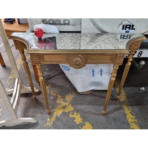 293 - Star Lot : A stunning console / hall table with a heavily foxed mirrored top, held on fabulous turne... 