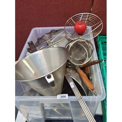 306 - A collection of commercial kitchen equipment such as a colander, spiders, sieves, deep fry strainers... 