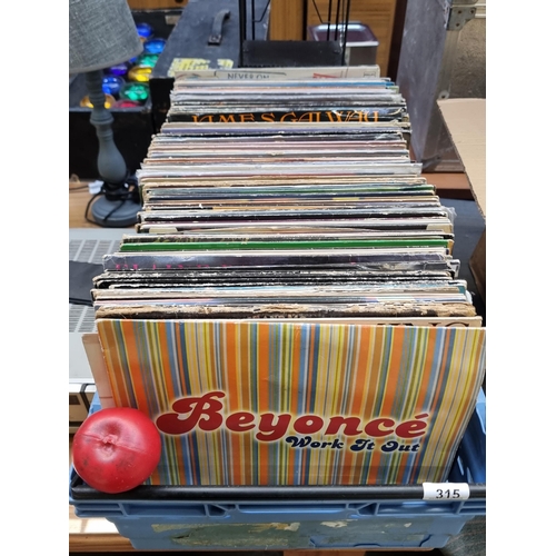 315 - A large box of vinyl records unchecked.