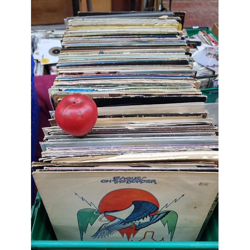 333 - A large and impressive collection of vinyl records from various different artists and genres. Unchec... 