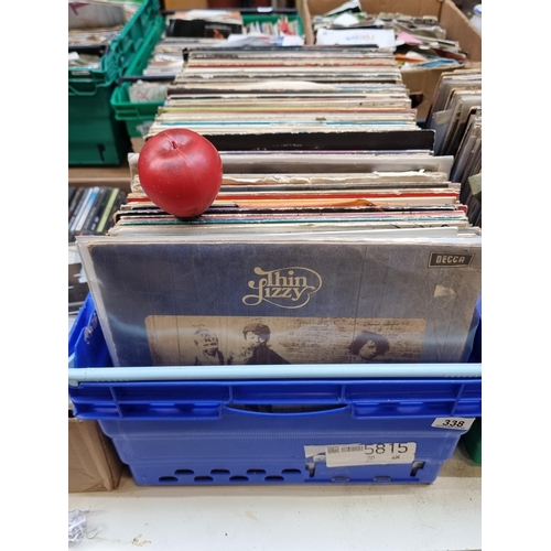 338 - A large and impressive collection of vinyl records from various different artists and genres. Unchec... 