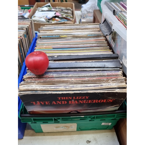 339 - A large and impressive collection of vinyl records from various different artists and genres. Unchec... 