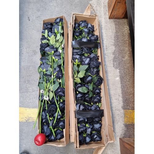 379 - Two boxes filled with black silk artificial log stemmed roses. Ideal for flower arranging or craft p... 