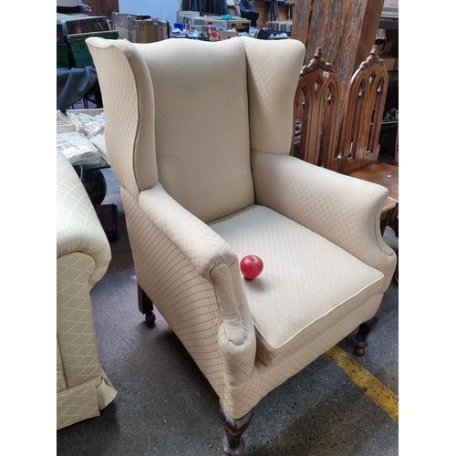 386 - A fabulous Victorian Queen Anne wing back arm chair on ball castors. Has been professionally reuphol... 