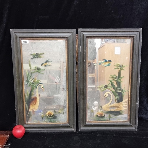 88 - A pair of early 20th century mirrors with hand painted crane and swan lakeside elements. Housed in b... 