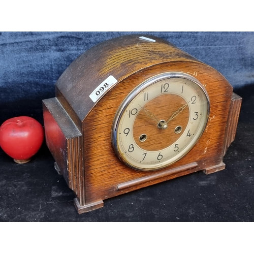 98 - A handsome Art Deco Bentima Perivale mantle clock. Featuring a wooden case with attractive carved de... 