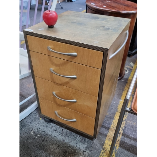 409 - A modern cabinet with 4 drawers, two-tone finish and chrome handles with two to sides.