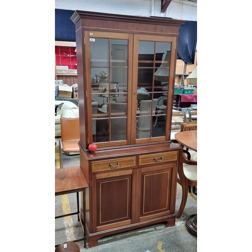 417 - Star Lot : An elegant display cabinet with three shelves behind glass doors to top and cabinet to ba... 