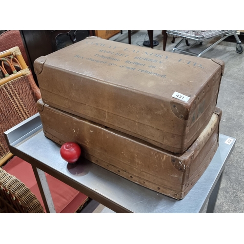 431 - Two vintage British hard shell laundry boxes.