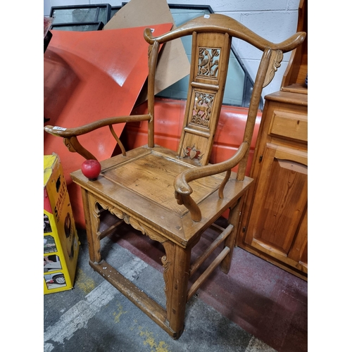 447 - A stunning 19th Century Chinese lacquered carved Elmwood Wedding chair featuring traditional motifs.