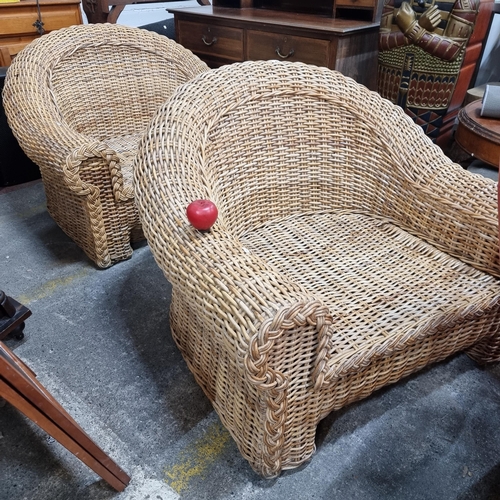 453 - A fabulous pair of large well made whicker armchairs. Extremely comfortable, ideal for the conservat... 