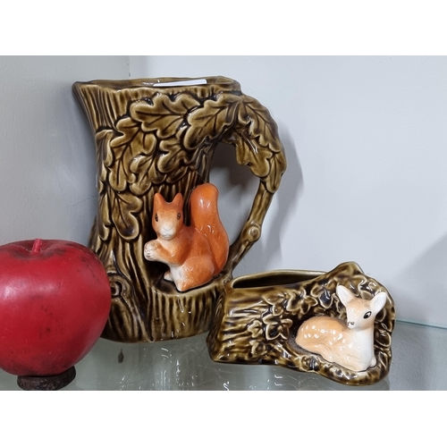 490 - Two Sylvac items including a jug featuring a squirrel and a tree and the other featuring a fawn.