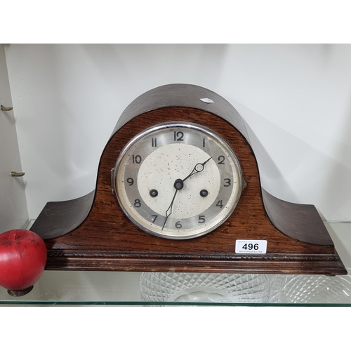 496 - A vintage Napoleon hat shaped mantle clock. By the Hamburg American Clock Company.