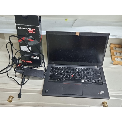 507 - A Lenovo Thinkpad laptop with original charger. The Laptop needs to be wiped you can use it as a gue... 