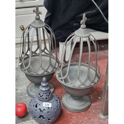 538 - A pair of large birdcage style planters with a fleur de lis finial along with a smaller oriental sty... 