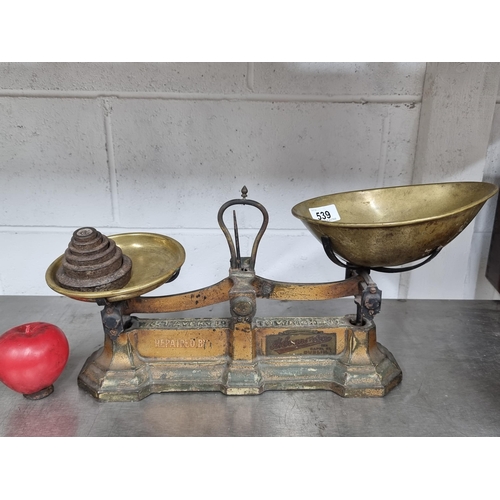 539 - A fabulous vintage Avery cast iron weighing scales complete with its full array of weights. H Evans ... 