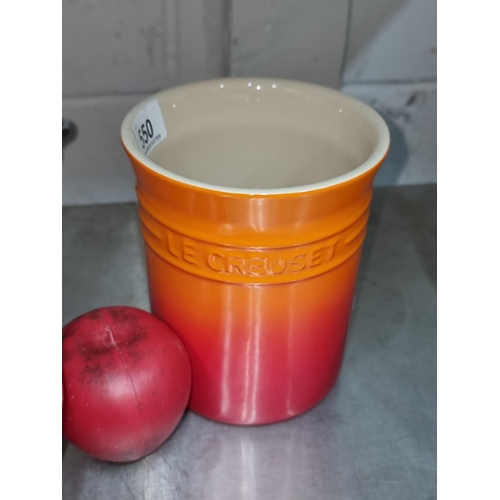 550 - A Le Creuset ceramic kitchen utensils jar in an ombre red and orange finish. In very good condition.