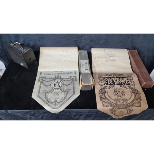 566 - Three vintage collectables including two pianola rolls inc Pigott Dublin along with a Kodak No. 2A B... 