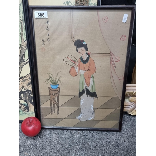 588 - An elegant Chinese gouache on silk painting featuring a lady in interior scene. Housed in a black fr... 