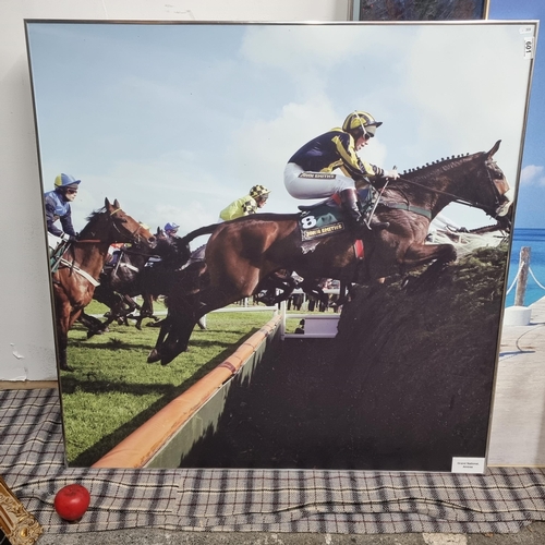 601 - A large high quality photographic Horse racing print from the famous Aintree Grand National. Housed ... 