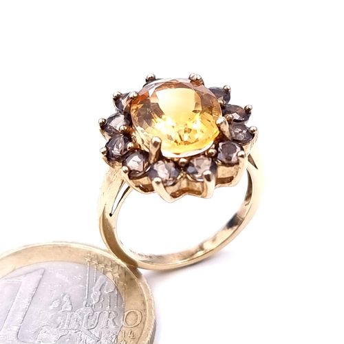 625 - Star lot : A nice example of a heavy Gold citrine stone ring with smoky quartz stone surround mounte... 