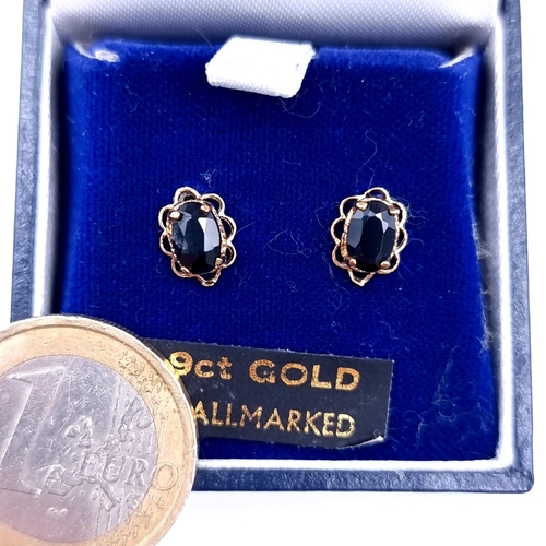 644 - A pair of hallmarked 9K gold Sapphire stud earrings for pierced ears,