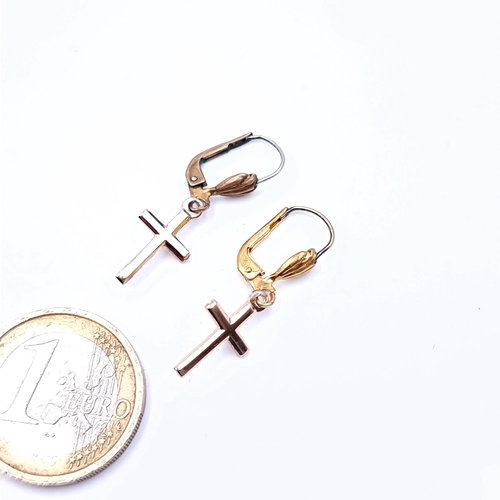 663 - A pair of 9 kt cross pendant earrings suitable for pierced ears, weight  Boxed.