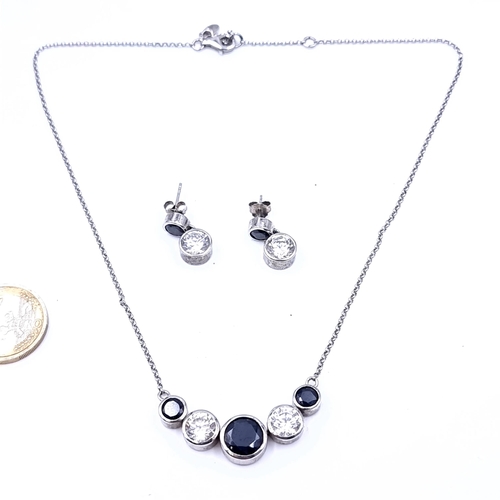 678 - A pretty Sterling Silver gemstone pendant necklace, length 40cm together with a matching pai rof dro... 