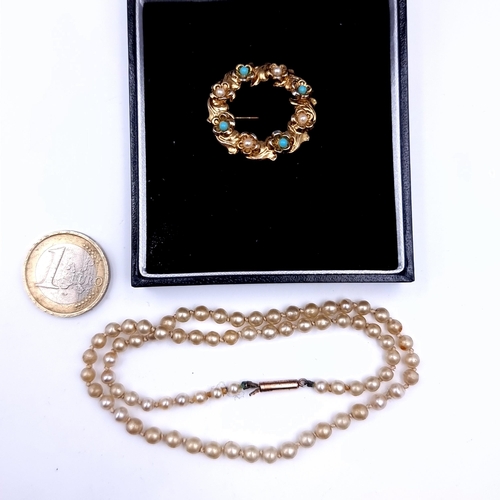 693 - An antique graduated pearl necklace set with gold clasp, length 38cm together with a pearl and turqu... 