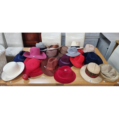 709 - A superb collection of vintage hats in a variety of styles and materials. Includes many felt and str... 