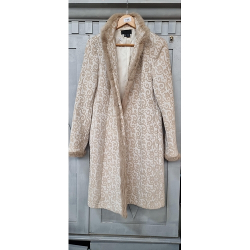 714 - A sophisticated Zara women's coat in a beige brocade fabric with fur trim to cuffs and collar. Women... 