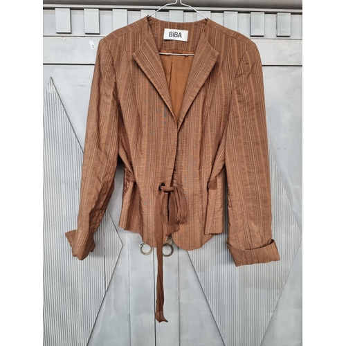 719 - An elegant Biba ladies' jacket in timeless brown with a tactile striped design. Comes with chiffon b... 