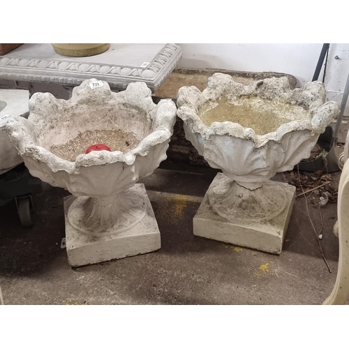 729 - Star lot : A pair of elegant, very heavy reconstituted stone garden stemmed planters. H45cm