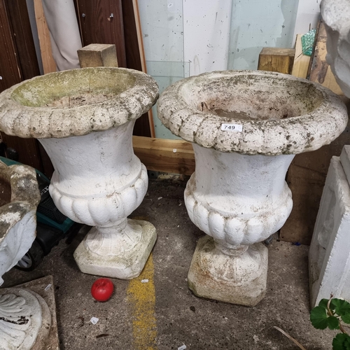 749 - Star lot : A pair of extravagant large  stone garden planters with scalloped detailing and footed ba... 