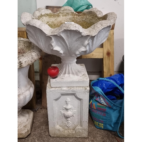 754 - A fabulous and large stone garden planter with fluted top and held on a pedestal. Its a beauty.