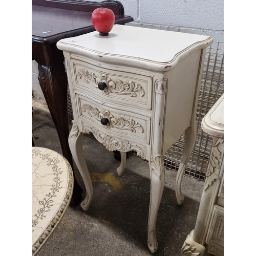 757 - Charming French style cabinet with two drawers and gilt moulding.