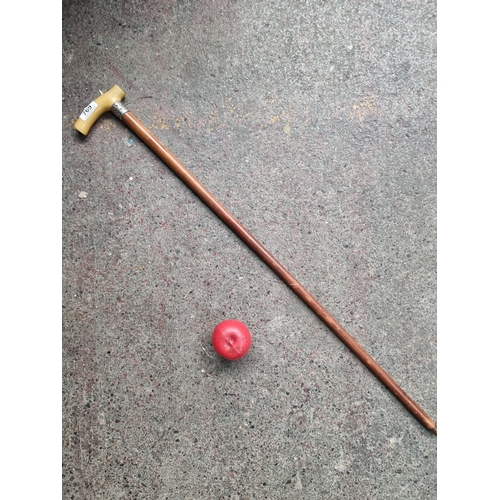 769 - A handsome antique walking stick / cane with a sterling silver collar marked Birmingham and dating t... 