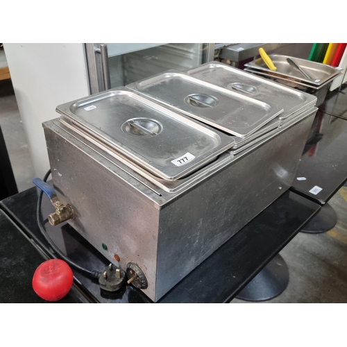 777 - A commercial stainless steel food warmer from Bain Marie, model BM-3V. With removable liners and lid... 